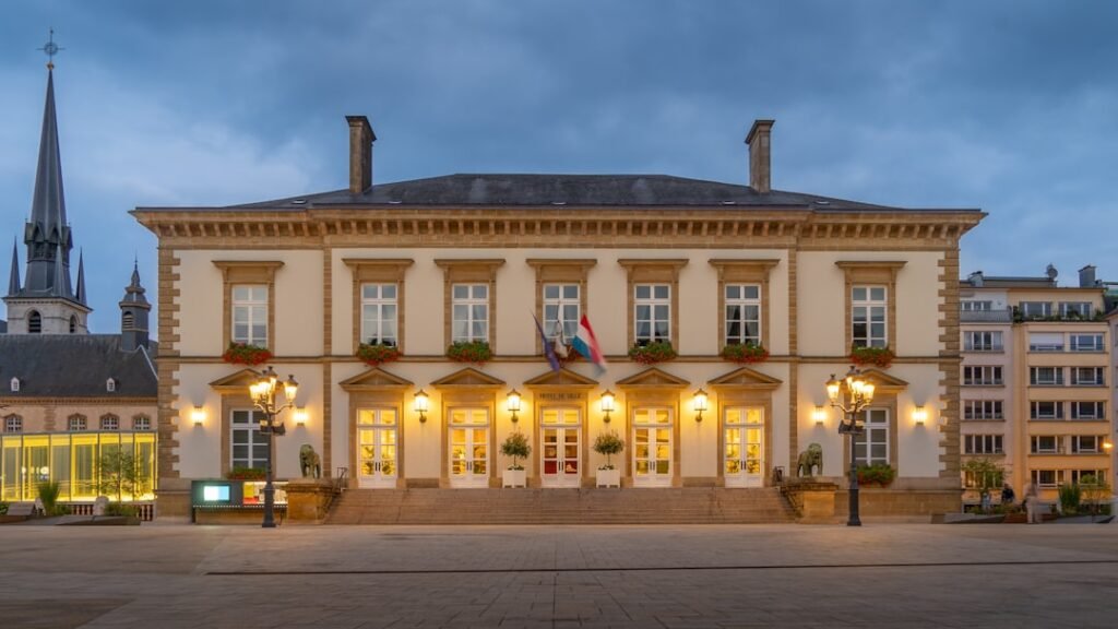 Elegant building illuminated at dusk.